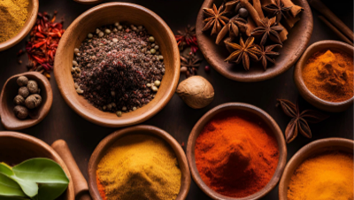 Chef brushing rotisserie chicken with marinade in kitchen
