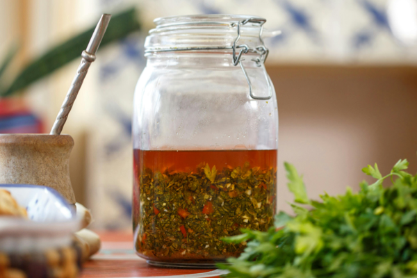 Fresh citrus and herbs used to tenderise rotisserie chicken before roasting